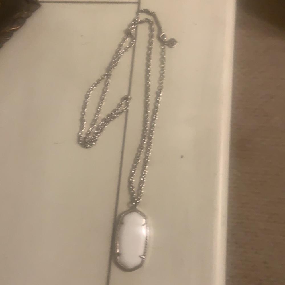 Kendra Scott long silver necklace with white pendant
